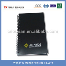 printed notebook with spiral notebook