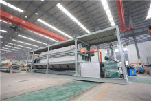 Conveying integrated filter press