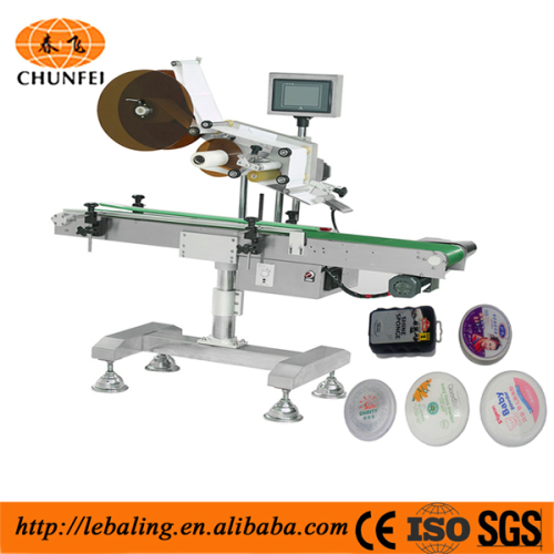 Automatic bottle mouth trapping label machine