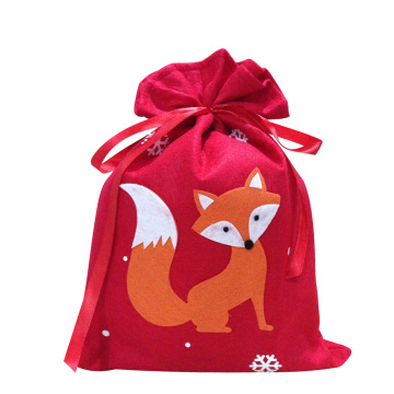 Red christmas sack with fox pattern