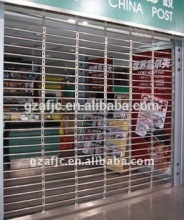 2015 Guangzhou galvanized steel grill rolling door, grill shutter door, iron grills for doors security
