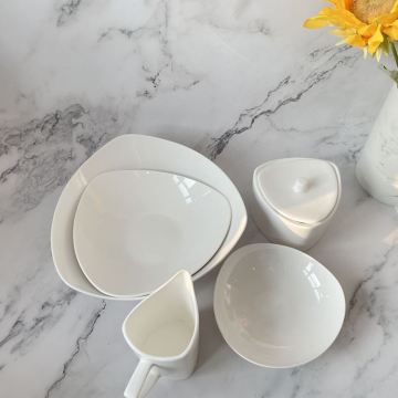 White ceramic kitchenware With salt bottle