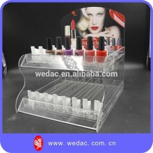 Spring push POS display stand for nail polish etc.