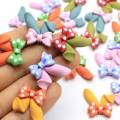 23 * 24MM 100Pcs Harz Flatback Hasenohr Cabochons Kawaii Harz Kaninchen Hasenohr Mit Polka Dot Bogen Schmuckherstellung DIY