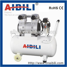 Light weight oil free silent piston air compressor