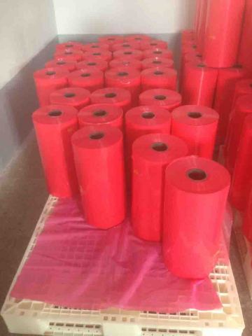 embossed film for conveyor belt and other rubber coated fabric