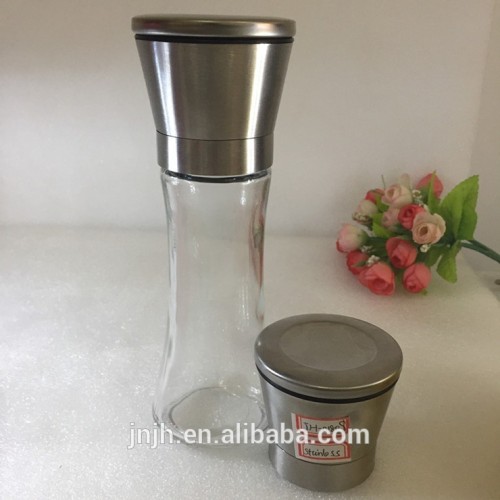 stainless steel grinder top with spice bottle