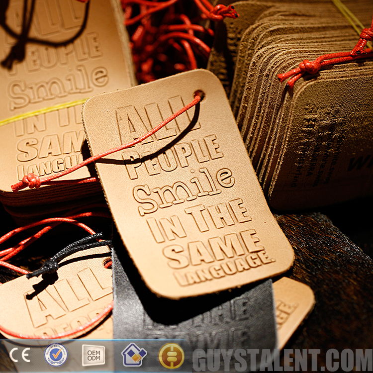 Custom hot stamping embossed logo leather hang tag With Trade Assurance