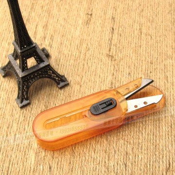 Mini scissors with cap