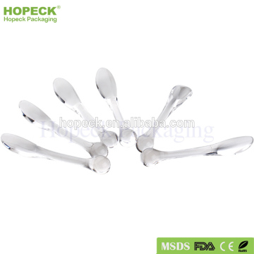 small plastic cosmetic spatula for eye cream