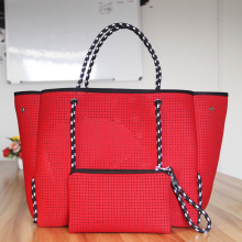 Red perforated foldable beach tote bag