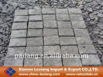 Grey granite paving block