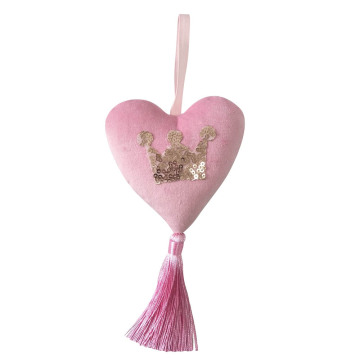 Pink Christmas heart shaped decorations with tassels