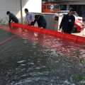 Residential home debris flood protection barrier