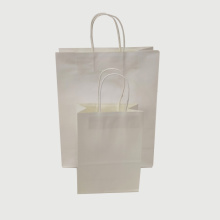 Embalaje de ropa Bolsa de compras de papel kraft blanca al por mayor
