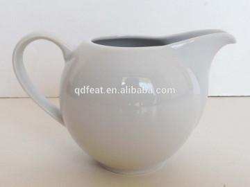 white ceramic porcelain milk jug