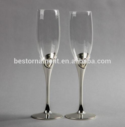 Shiny silver heart shape champagne glass