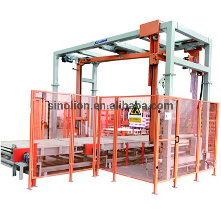 Rotary arm wrapper Top sheet dispenser packaging line