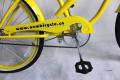 vélo de croiseur de plage jaune doux pour dame