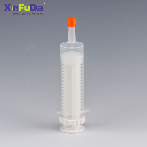 disposable colored syringe with plastic needle and logo