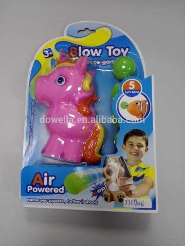 Air powered squeeze popper toy