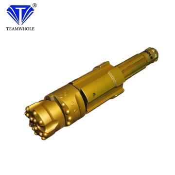 Eccentric Overburden Casing System with Three-Piece Rock Drilling Tools