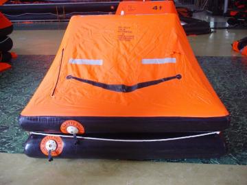 Throw-overboard inflatable life raft