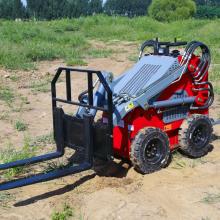 Bộ tải skid-steer với xô bốn trong một