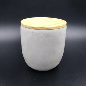 Scented cement container candle