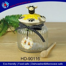 2016 Newest high quality transparent glass jar/ceramic honey jar/honey canister ceramic bee lid with wooden dipper