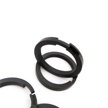 Wear resistant carbon filled PTFE piston backup ring