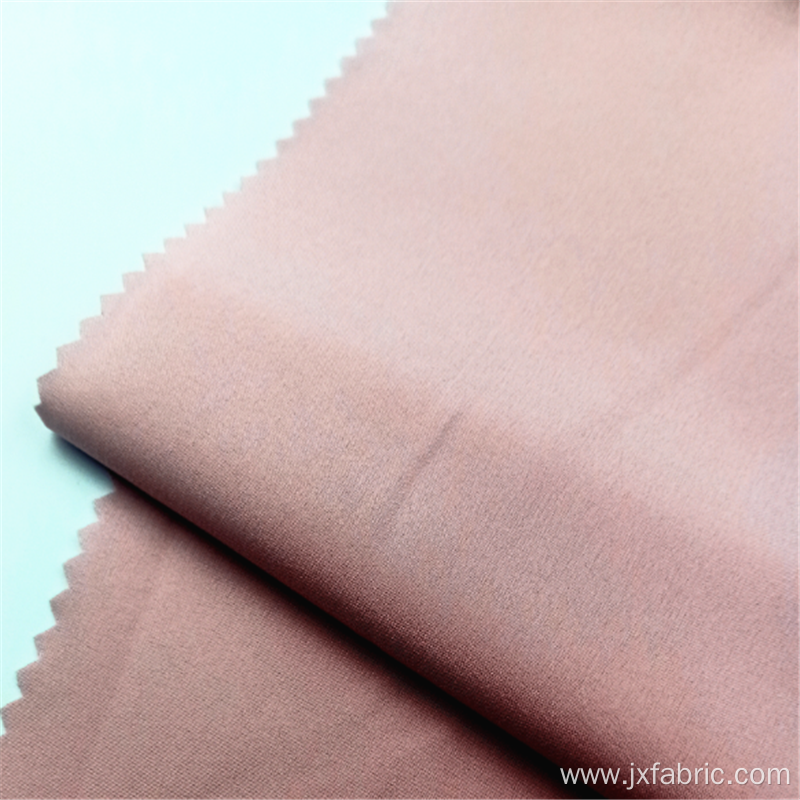 Peach 4 Way Stretch Polyester Spandex Dress Fabric