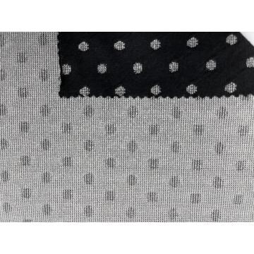 Tissu jacquard 85% polyester 13% lurex 2% élasthanne