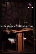 Absolute black granite round vessel sink