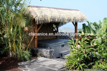 Tropical Setting Mexican Rain Cape Palapa with cheap plastic grass roofing
