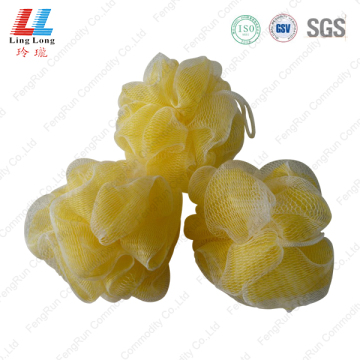 Yellow double mesh bath sponge