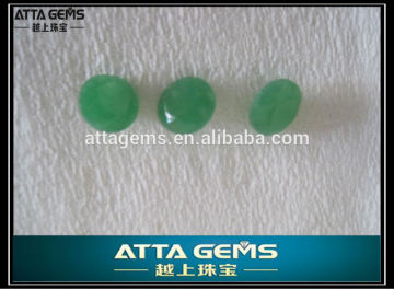 look like green color oval cut Malay Jade