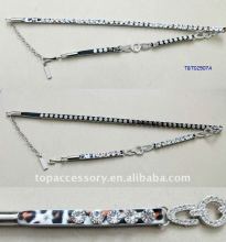 silver chain with leopard grain leather belts