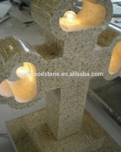 granite g682 yellow granite cross headstone with light