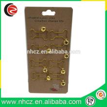 Gold Bone paper clips with bell