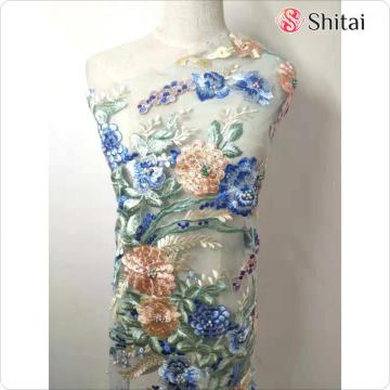 coulorful embrodery fabric with beads