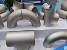 Titanium alloy elbow tube