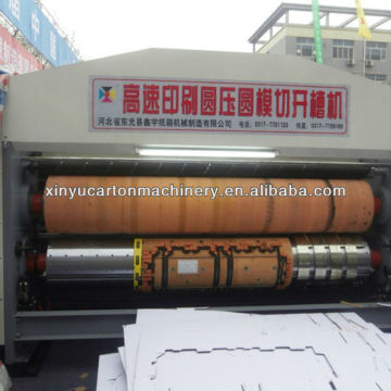 Machine for manufacturing corrugated cartons