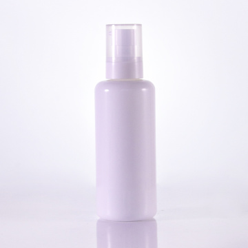 Botella de loción blanca de hombro redondo con cubierta clara