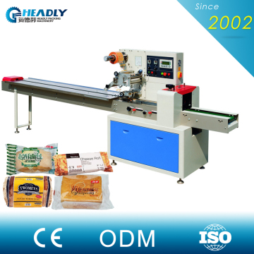 High speed rotary tampon plastic bag flow packaging machine