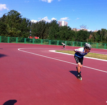 Outdoor skating rink surfaces