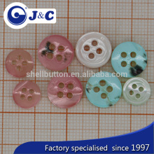 bottom with spray painting trocas shell buttons