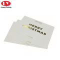 Feliz Navidad impresión de tarjetas de regalo con logo dorado.