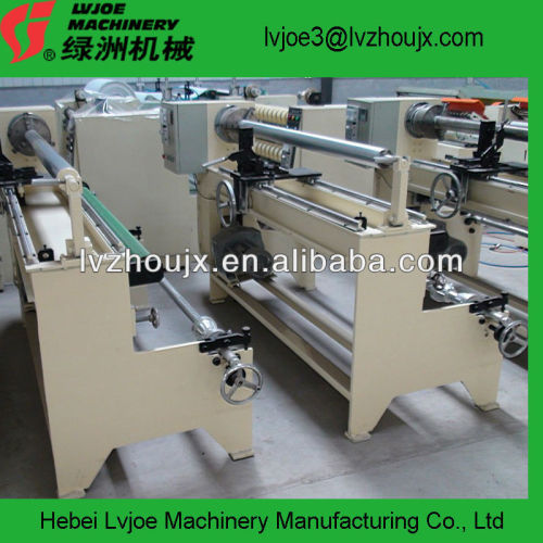 Manual adhesive tape rewinder and slitter