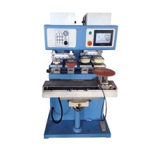 Pad printer with shuttle for plastics plate